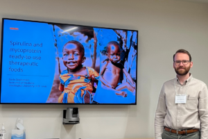 Kevin Stephenson, MD, Presents Research at USAID Lecture