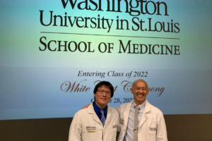 Coaches place white coats on the entering class of 2022 – Randy Laine, MD and Dennis Chang, MD